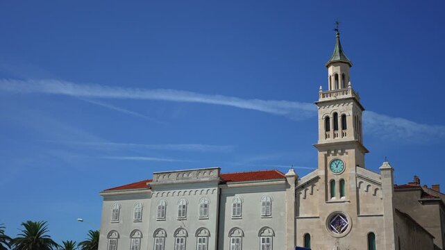 Historic stone church of Saint Francis with bell tower in Split Croatia.