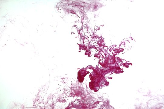 Red color on white background,Abstract smoke pattern,Colored liquid dye,Splash paint