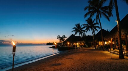 Naklejka premium tropical beach resort at twilight with lit tiki torches. ocean water and palm trees against sunset sky. luxury thatched villas. summer vacation travel. banner, website header with copyspace.