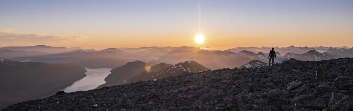 Evening atmosphere, Jostedalsbreen National Park, hiker looking from the top of Sk&aring;la mountain to Innvikfjorden fjord, Breheimen mountain range, Stryn, Vestland, Norway