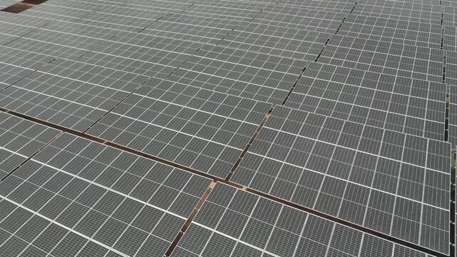Solar panel at at the solar farm. Renewable energy. Clean Sustainable Energy . Aerial drone shot