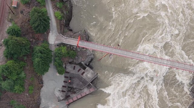 Fish Ladders at Hells Gate water swirling around in the narrows bridge over the river.