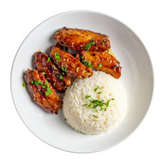 Fototapeta premium Glazed chicken wings with rice serving on plate