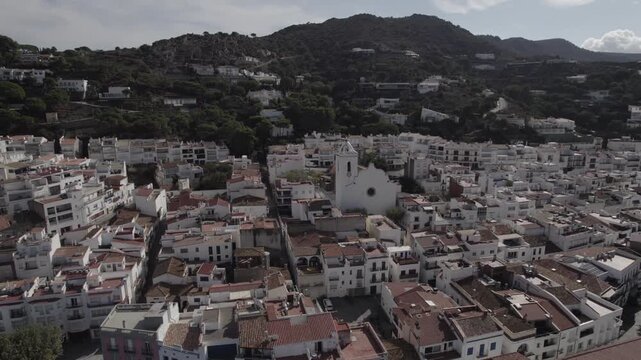 Aerial Drone Partial Orbit Around Port de la Selva Town, Costa Brava, Spain
