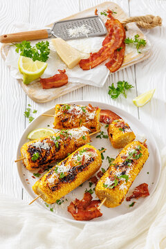 Corn elote street style is served on a plate