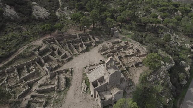 Aerial Drone Orbit Around Ancient Church Ruins at Sant Pere de Rodes, Costa Brava, Spain
