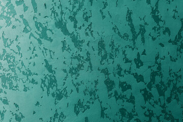 Obraz premium Textured teal background with abstract pattern