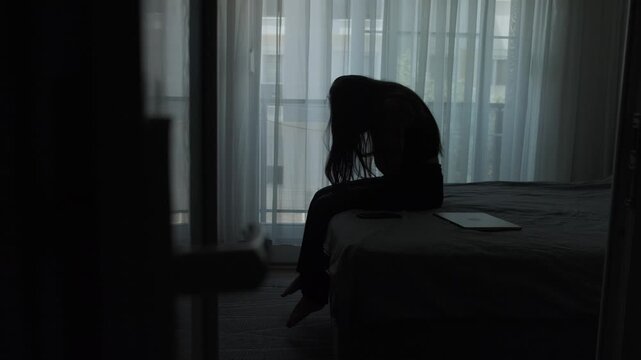 Digital nomad burnout and emotional fatigue concept, woman feeling disconnected from home after repeated relocation and temporary living
