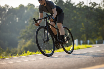 Naklejka premium People cycling on the greenway