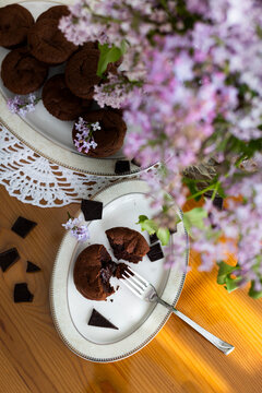 Homemade broken chocolate cake or chocolate fondue with liquid filling