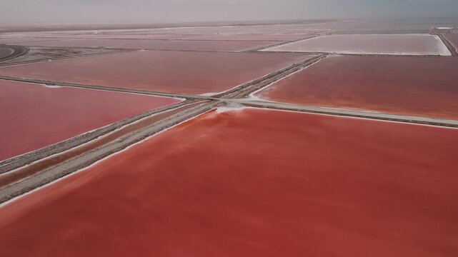 Aerial view of pink salt lakes in walvis bay, namibia, for salt production and evaporation