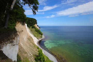Obraz premium View from the cliff-top hiking trail of the chalk cliffs in Jasmund National Park on the island of Rügen, Baltic Sea – Germany, 2026