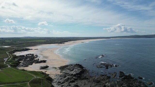 4K Aerial Still Drone Shot of Wide Sandy Beach, Rocky Shoreline and Coastal Path on a Sunny Day, Godrevy Point and Pembrokeshire Coast, Wales, United Kingdom