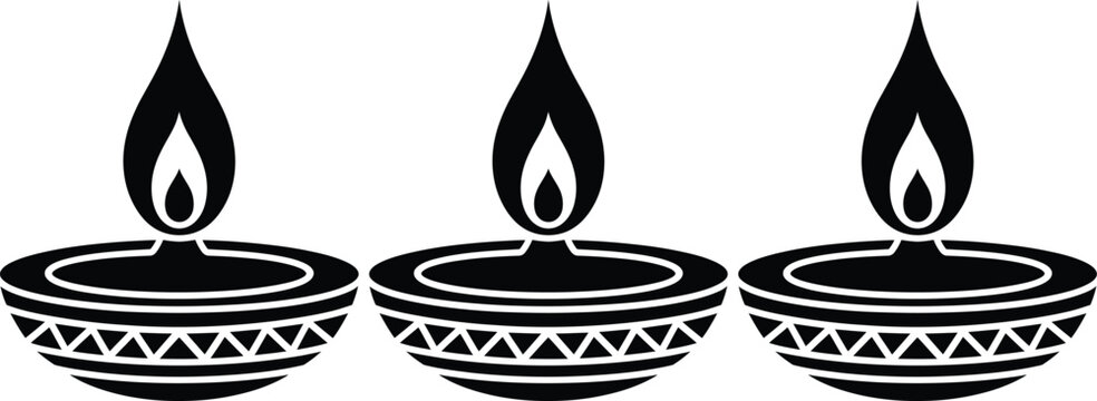 Three oil lamps with flames on decorative bases