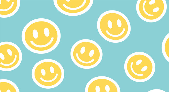 A pattern of yellow smiley faces on a light blue background