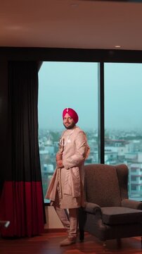 Vertical Cinematic Doorway Reveal of a Sikh Groom Before his Wedding