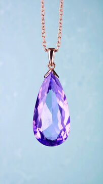 Enchanting purple teardrop gemstone pendant on a delicate rose gold chain, symbolizing elegance