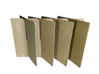 Stack of four brown kraft paper books or pads © iyasmin