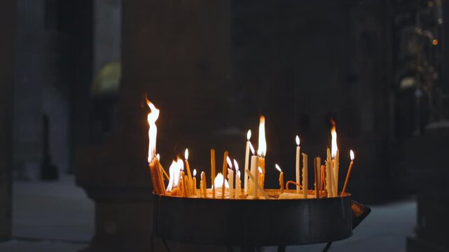 Candles in the Church of the Holy Sepulchre. Church of the Holy Sepulchre. Old Jerusalem. Interior of the Church of the Holy Sepulchre. Jerusalem tour. Travel to Israel.
