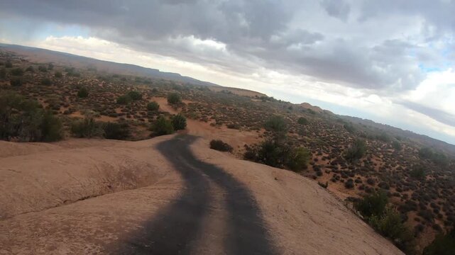 Cinematic adventure footage around Moab Utah with red rocks and off-road excitement