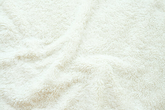 Soft White Plush Fur Texture Background with Cozy Fluffy Fabric Surface