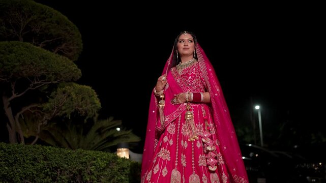 Cinematic Portrait of Traditional Punjabi Bride Posing Outdoors At Night