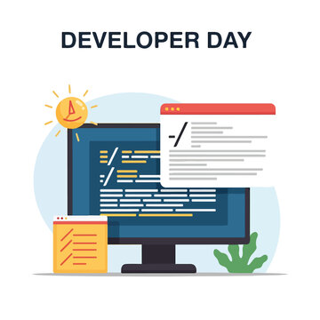 Developer day concept with computer and documents
