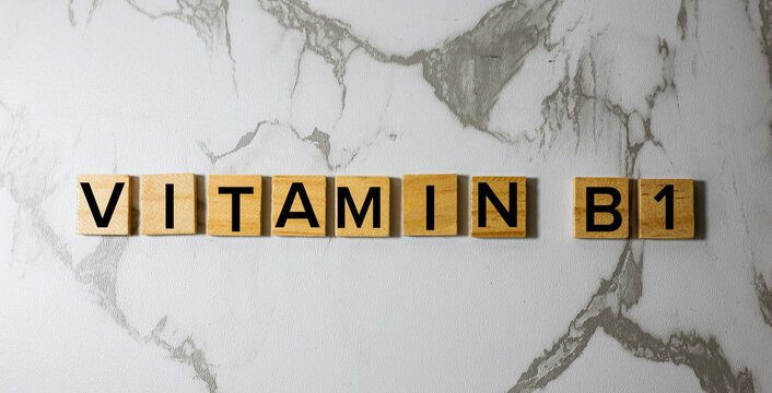 Vitamin B1 Wooden Letter Blocks on Marble Background Healthcare Nutrition Concept