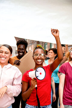 Diverse group rallying together photo