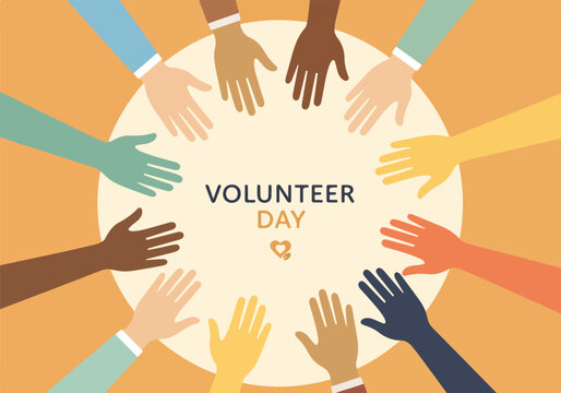 Diverse hands reaching for volunteer day