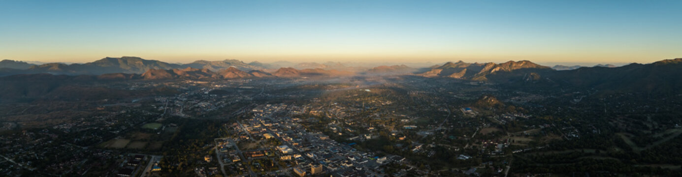 Aerial view of Mutare city at sunrise with mountains
