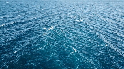 Obraz premium Deep Blue Ocean Water Surface with Waves and Whitecaps