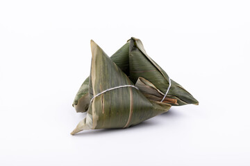 Fototapeta premium Three zongzi on a white background
