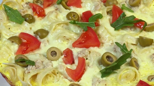 Pizza on chopped thin flat bread base with eggs