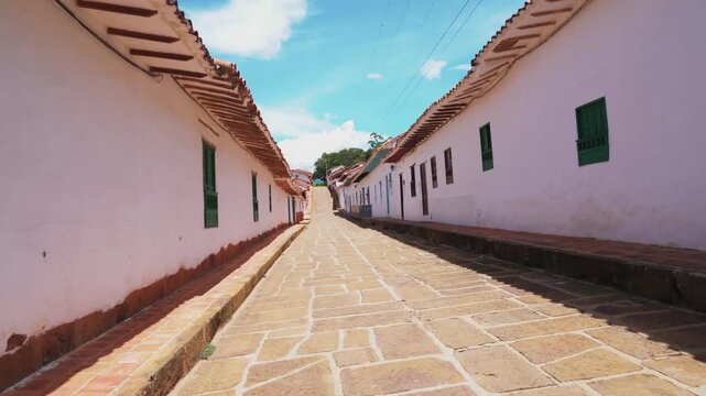 Traditional cobblestone street and colonial house in Barichara, Santander, Colombia