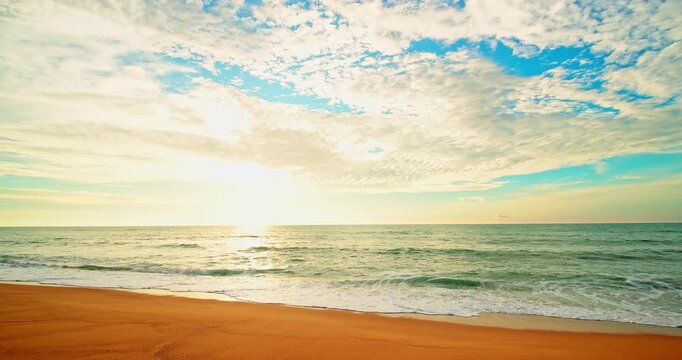 Beautiful sky sunset or sunrise over sea surface beautiful wave Amazing light twilight sky sunset. Cinematic footage beautiful light of nature seascape Landscape