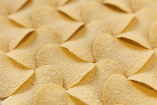 Crispy potato chips seamless pattern background texture