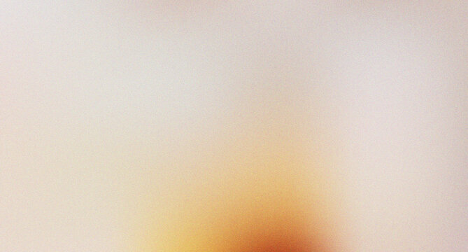 Vibrant grainy background with soft orange and white gradient light effect for modern artistic design