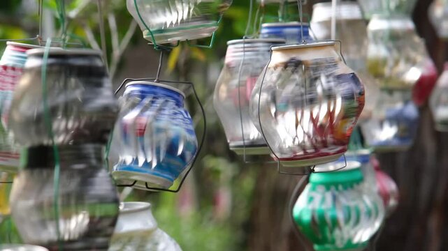 aluminum soda can wind spinners in the garden spinning in the wind