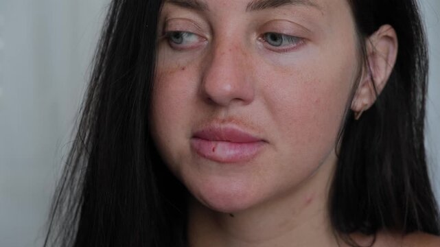 Anxiety and stress concept with woman biting lips in nervous habit, emotional tension and overthinking behavior in close up