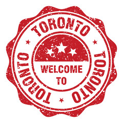 Naklejka premium Welcome to Toronto red grunge round stamp. Welcome to Toronto stamp