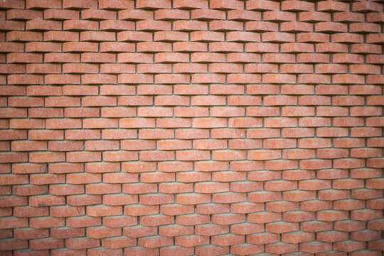 Decorative Red Brick Wall with Herringbone Pattern