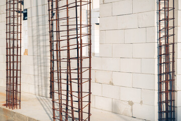 Naklejka premium Reinforcing steel framework prepared for concrete casting in a modern building project. Structural strength, contractor work and construction technology theme.