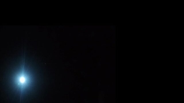 Paparazzi camera flashes animation on black background 4K. Photographer camera flashes ,Crowd stadium prism effect professional, Flashing lens flares seamless looping.