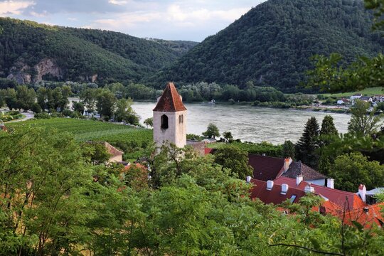 Durnstein, small town in Austria region Wachau. Durnstein town view with Danube river and vineyards.