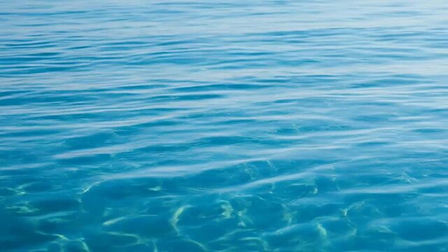 Calm blue ocean water surface with gentle ripples