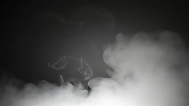 Dense white smoke swirls against a solid black background