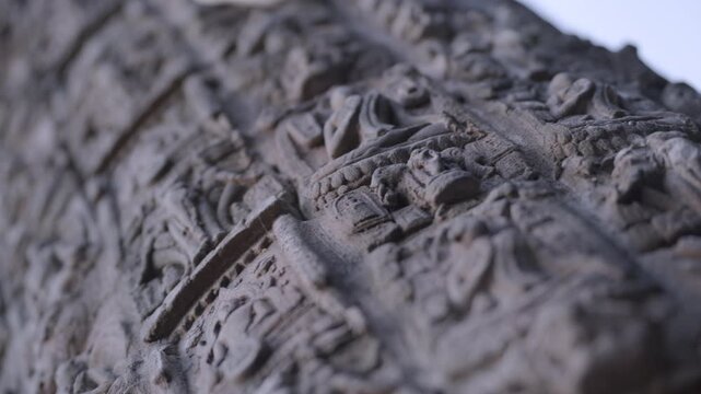 Mystical ancient religious stone carvings of Buddhist and Hindu deities.