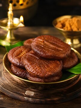 Traditional Indian Festive Adhirasam Sweet on Banana Leaf