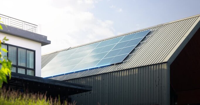 Rooftop solar panels featuring photovoltaic technology. Futuristic blue light overlay highlights smart monitoring, intelligent energy management, advanced solar technology, high-performance systems.